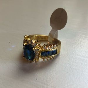 BEAUTIFUL 18 k gold filled size 7 ring navy blue stones and simulated diamonds
